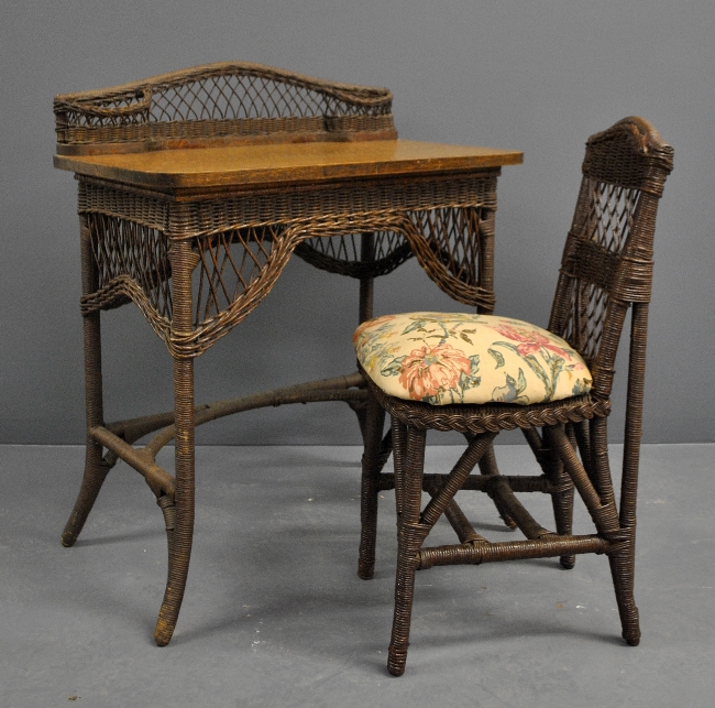 Appraisal: - Oak and wicker desk by Heywood-Wakefield h x w