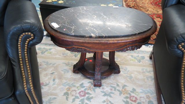 Appraisal: Carved Marble Top Table elaborate base oval top