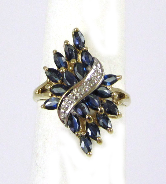 Appraisal: SAPPHIRE DIAMOND AND TEN KARAT GOLD RING The yellow and