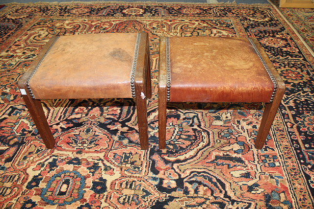 Appraisal: A pair of Arts Crafts walnut stools in the manner