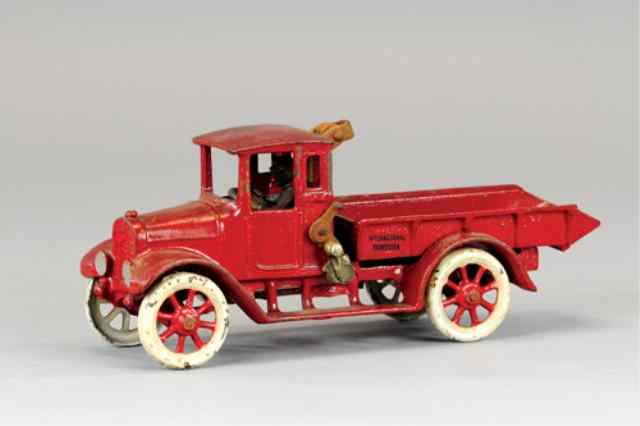 Appraisal: ARCADE RED BABY DUMP TRUCK Early version with spoke wheels