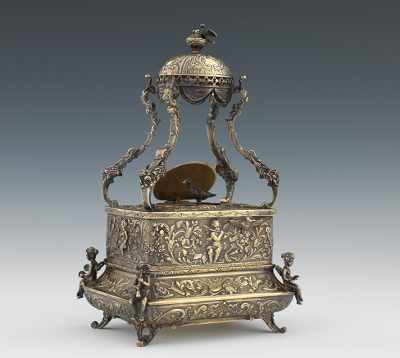 Appraisal: An Elaborate Singing Bird Automaton Silver gilt case on four