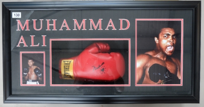 Appraisal: Framed presentation of colour Photograph and signed glove of three