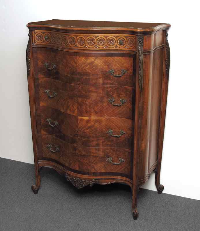 Appraisal: SERPENTINE FRONT FRENCH STYLE TALL CHEST Bombay sides carved and