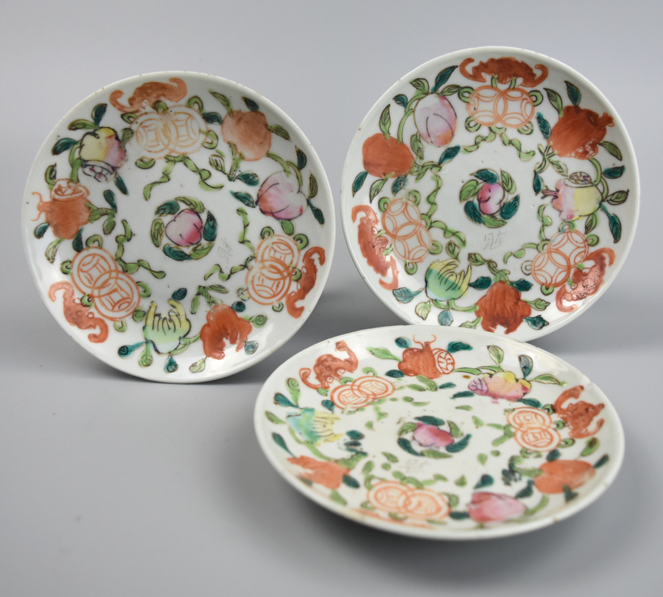 Appraisal: THREE CHINESE FAMILLE ROSE PLATE W PEACH TH C three