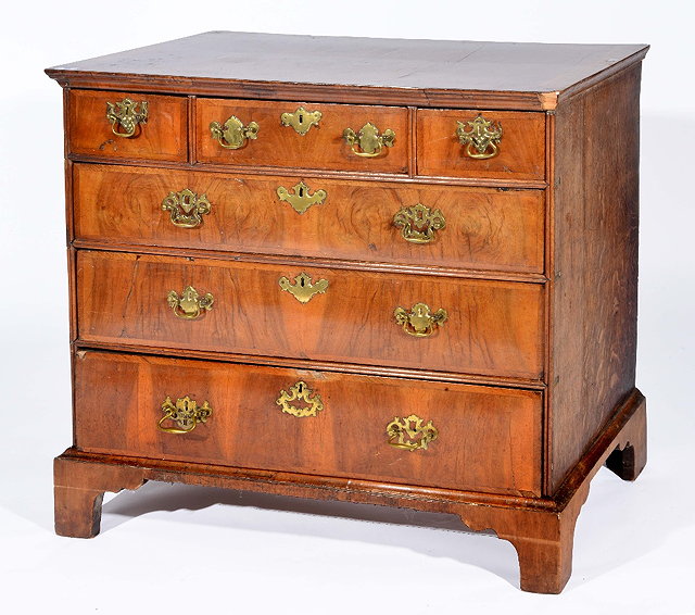 Appraisal: th Century walnut straight front chestof three short and three