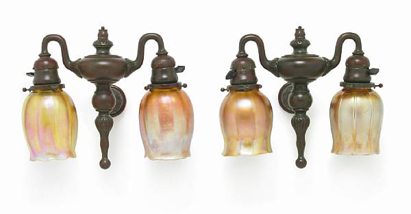 Appraisal: A pair of Tiffany Studios Favrile glass and patinated-bronze two-light