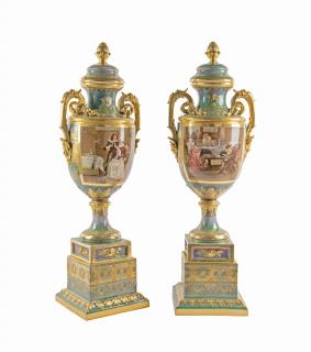 Appraisal: A PAIR OF CONTINENTAL STYLE PORCELAIN LIDDED URNS A PAIR