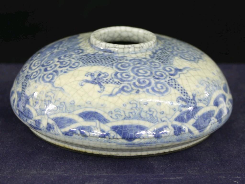 Appraisal: Small Oriental circular squat blue and white brush pot bearing