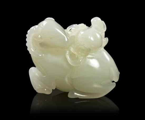 Appraisal: A White Jade Carved Ram Toggle depicting a ram and