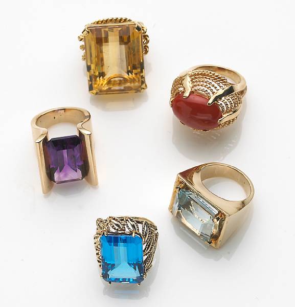 Appraisal: A collection of five gem-set k and k gold rings