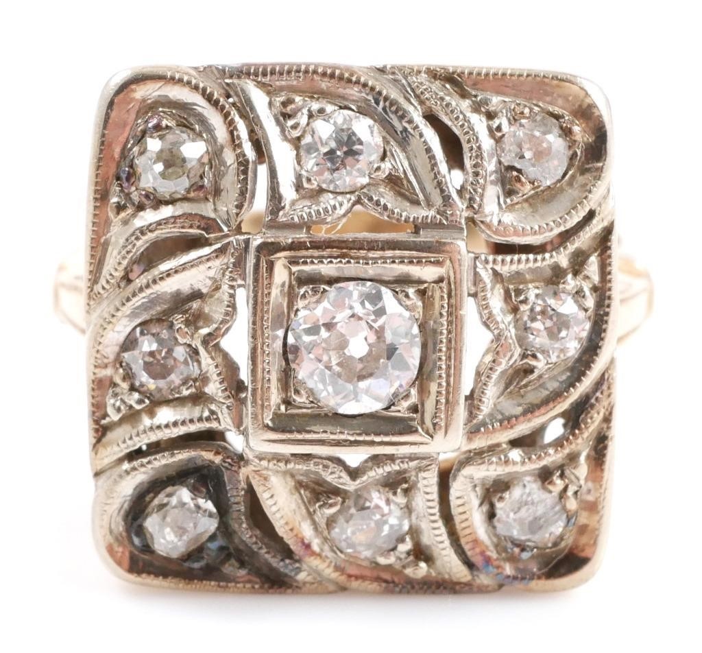 Appraisal: K yellow gold retro cluster ring contains old European round