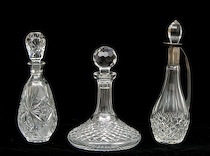 Appraisal: A Lot Of Three Cut Glass Decanters A lot of