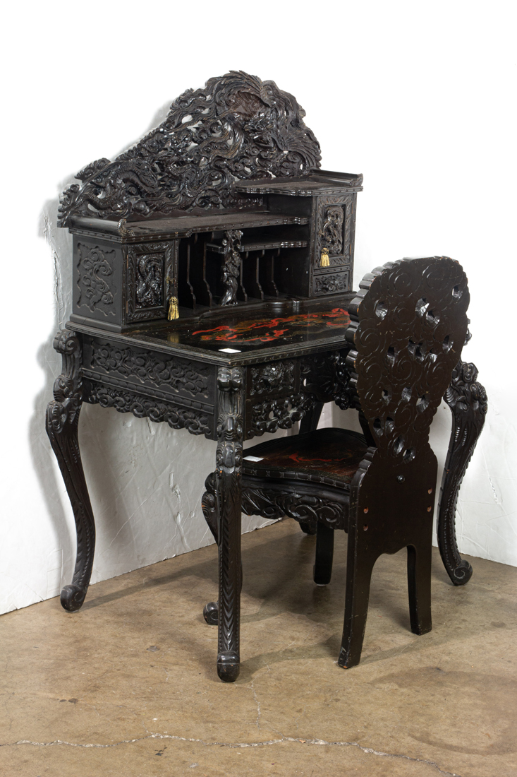 Appraisal: Japanese carvedwood desk and chair decorated with a 'dragon and