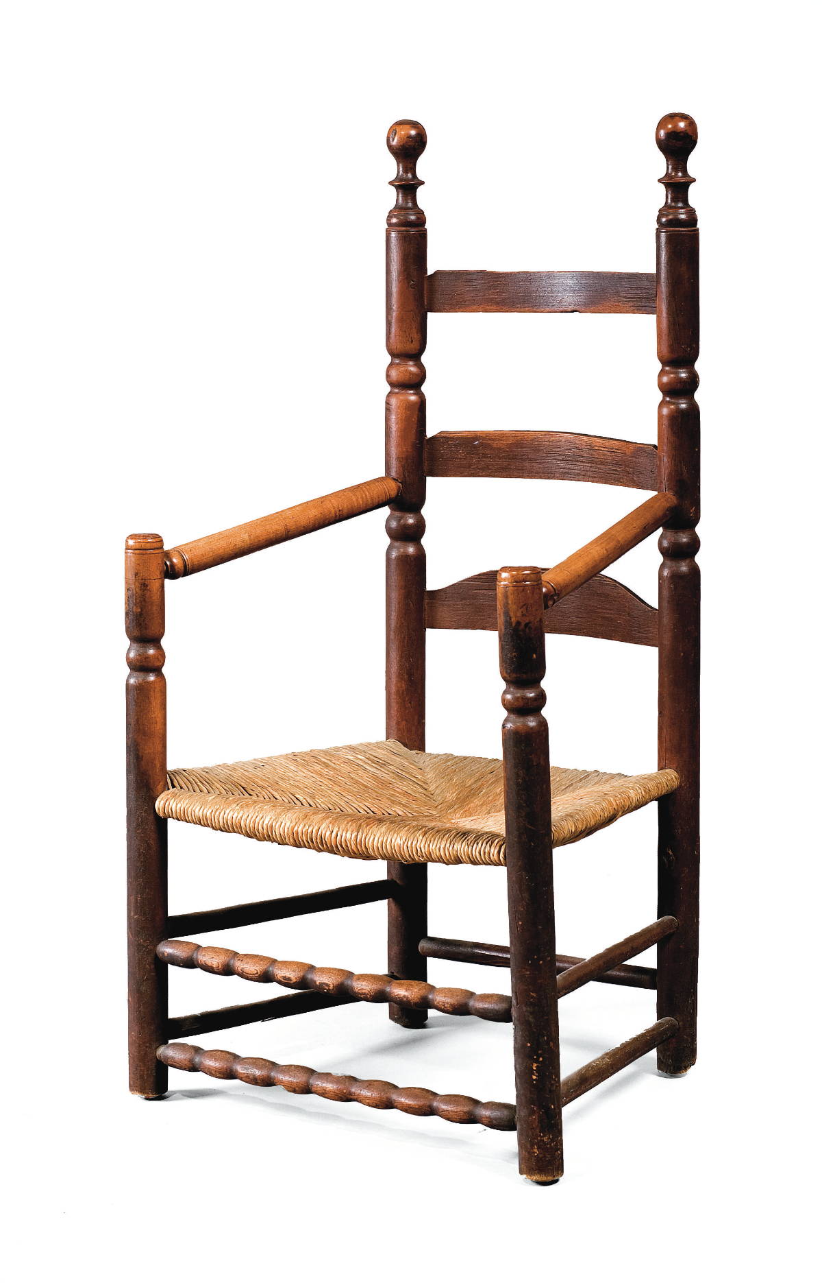 Appraisal: NEW ENGLAND PILGRIM CENTURY LADDERBACK GREAT CHAIR With sausage-turned frontal