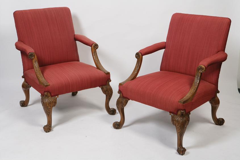 Appraisal: A PAIR OF GEORGE II STYLE GAINSBOROUGH ARMCHAIRS with rectangular