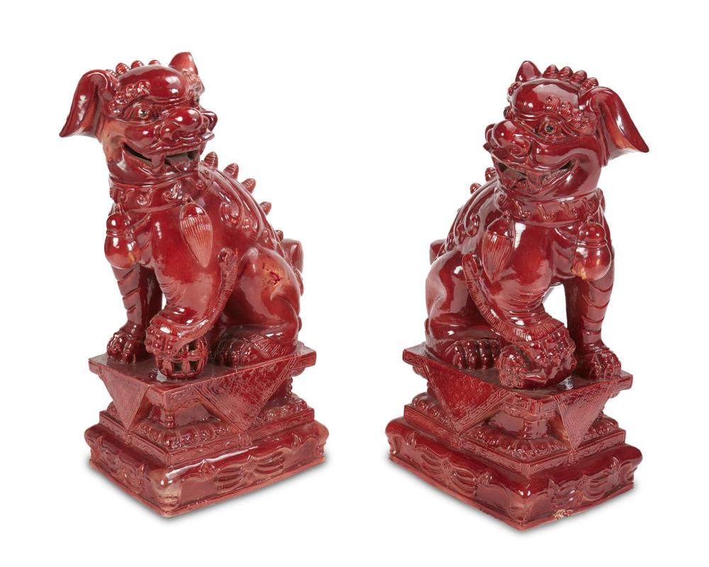 Appraisal: A pair of Chinese glazed ceramic Shishi guardian lions th