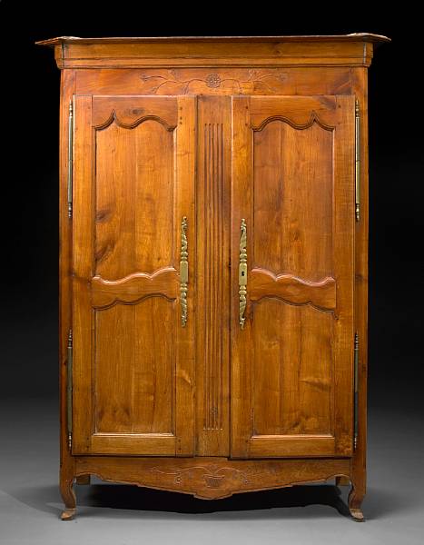 Appraisal: A Louis XVI provincial cherry armoire fourth quarter th century