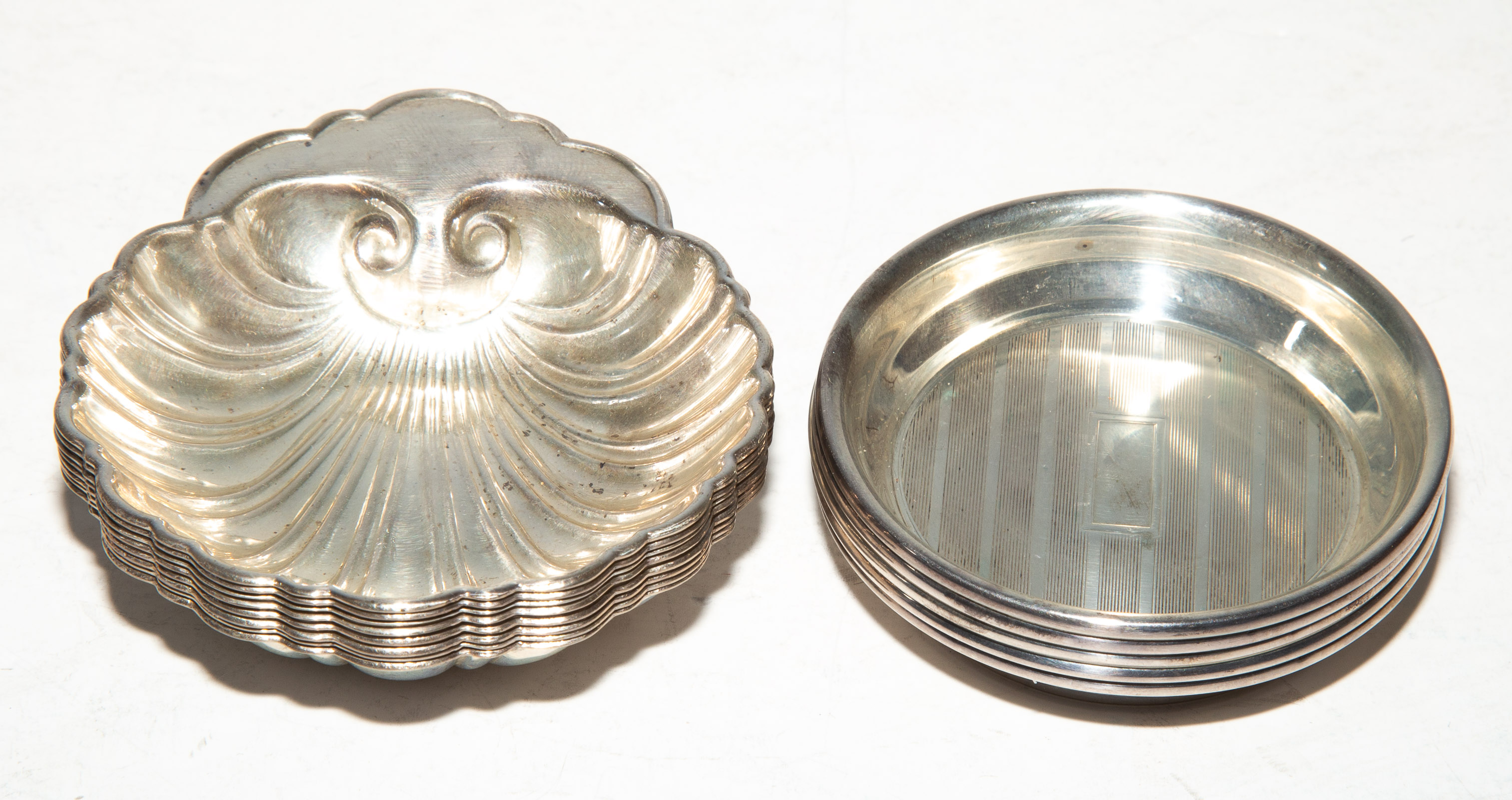 Appraisal: COLLECTION STERLING NUT DISHES Including eight shell-form and five round