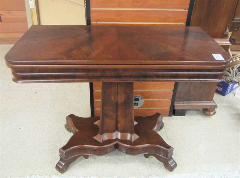 Appraisal: EMPIRE MAHOGANY GAME TABLE American mid- th century the rectangular