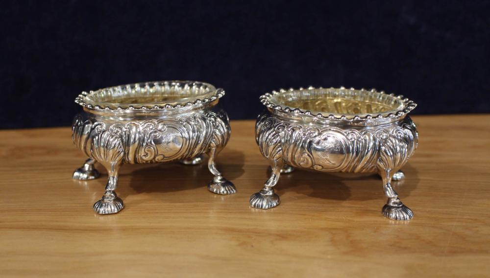 Appraisal: PAIR OF VICTORIAN ENGLISH STERLING SILVER MASTER SALT CELLARS footed