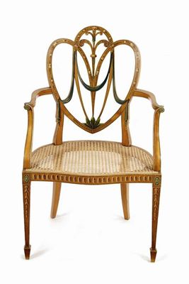 Appraisal: A satinwood and polychrome decorated open armchair in Sheraton revival