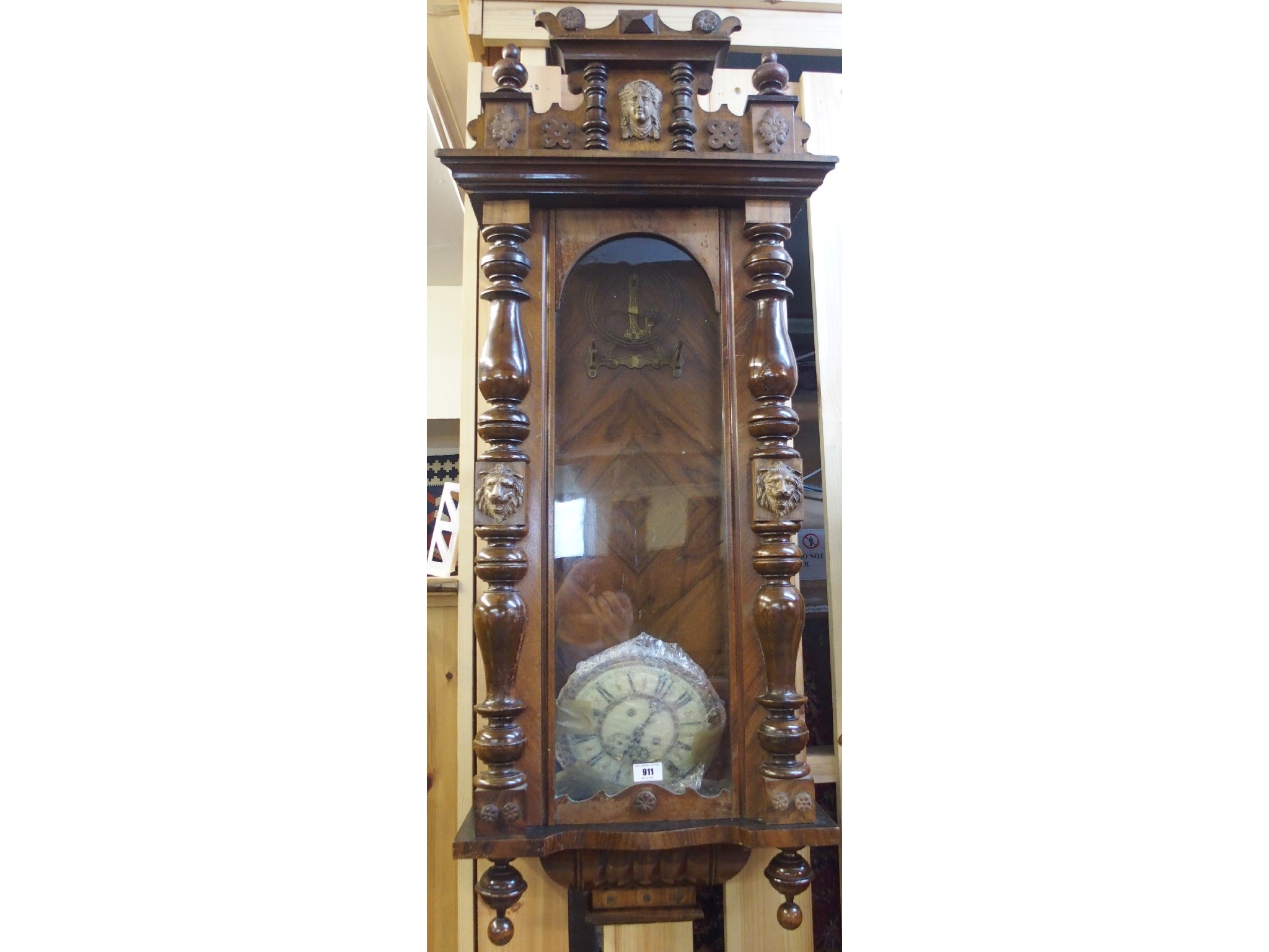 Appraisal: A Victorian walnut wall clock