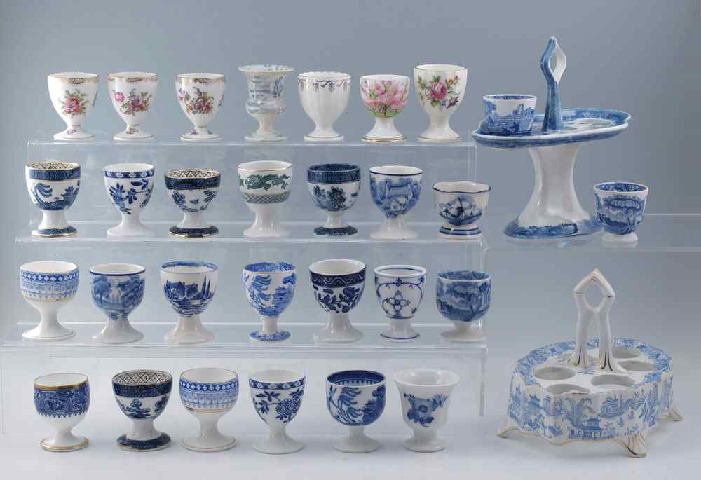 Appraisal: PIECE COLLECTION EGG CUPS AND TWO STAFFORDSHIRE EGG STANDS To