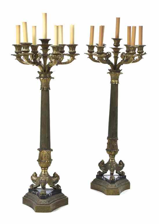 Appraisal: A Pair of Empire Style Gilt Bronze Seven-Light Candelabra each