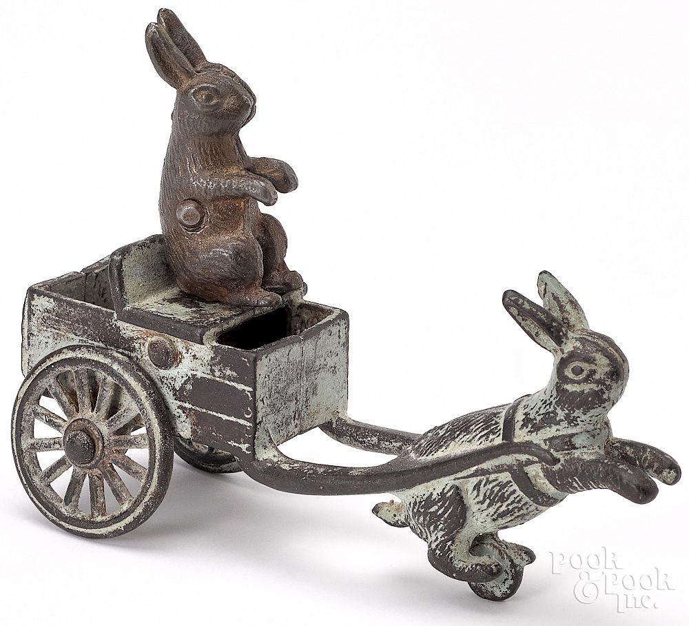 Appraisal: Cast iron rabbit drawn cart Cast iron rabbit drawn cart