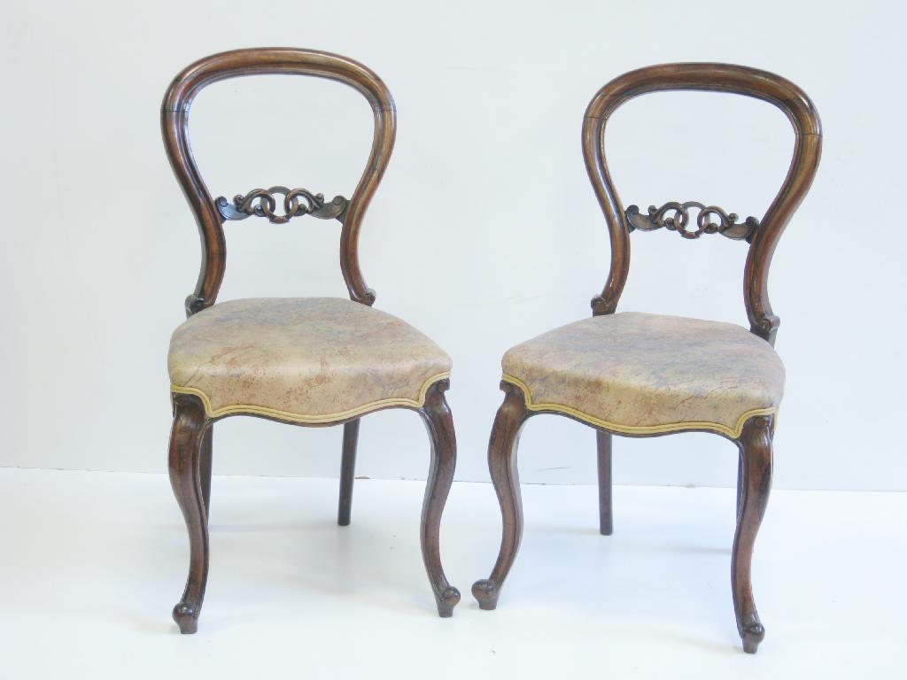 Appraisal: Pair of Victorian rosewood balloon back Single Chairs with stuff