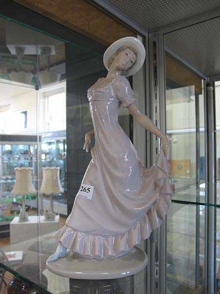 Appraisal: NAO FIGURE OF A GIRL IN DRESS WITH HAT