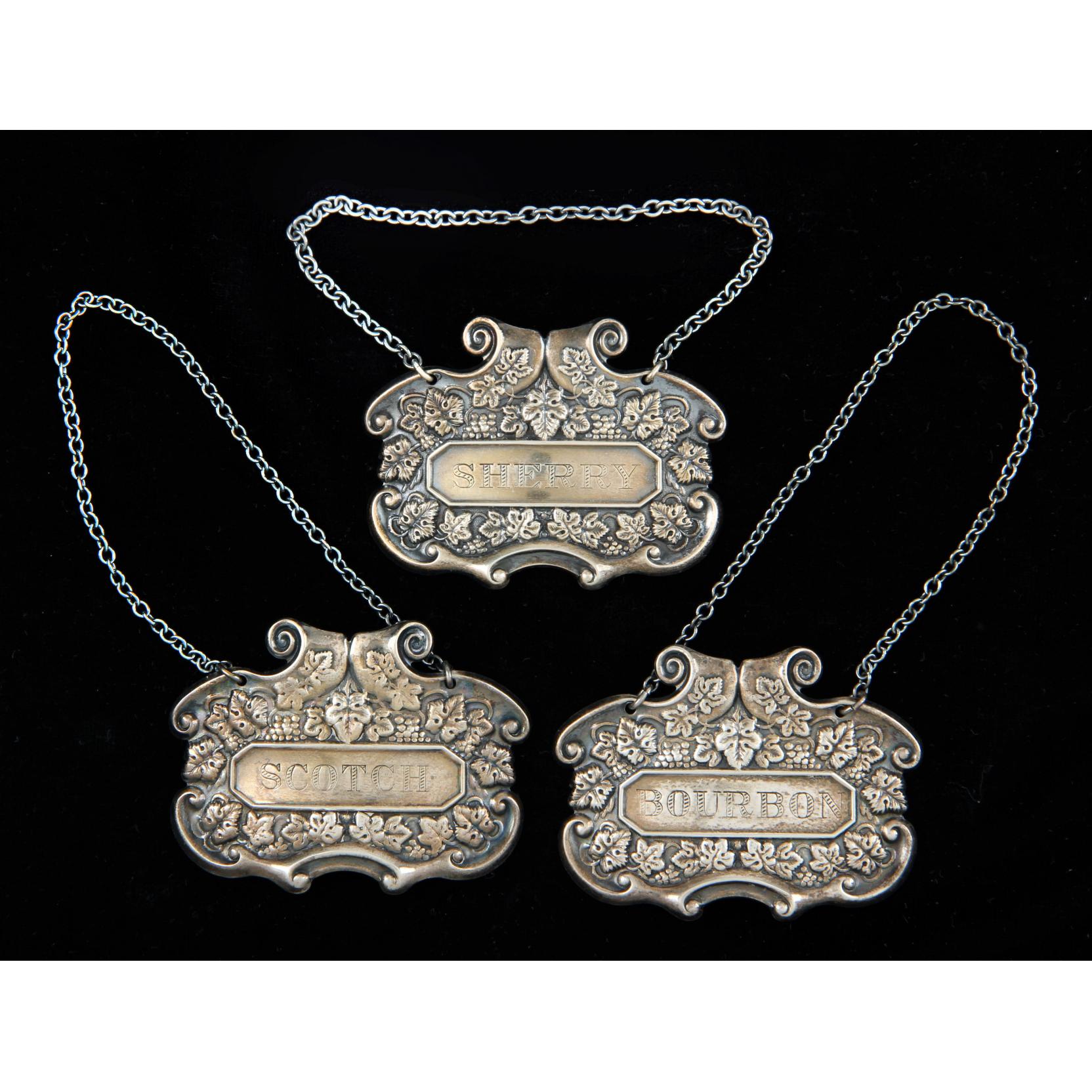 Appraisal: Set of Three Sterling Silver Decanter Tags including Sherry Scotch