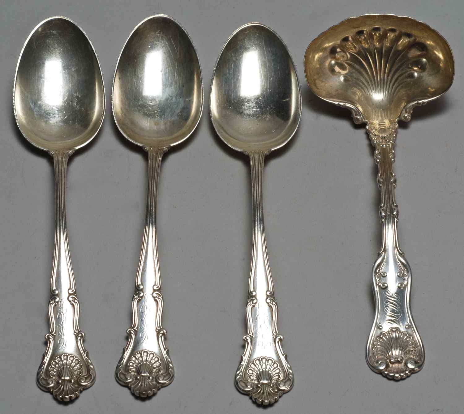 Appraisal: FOUR STERLING SILVER SERVING PIECESThree serving spoons by William B