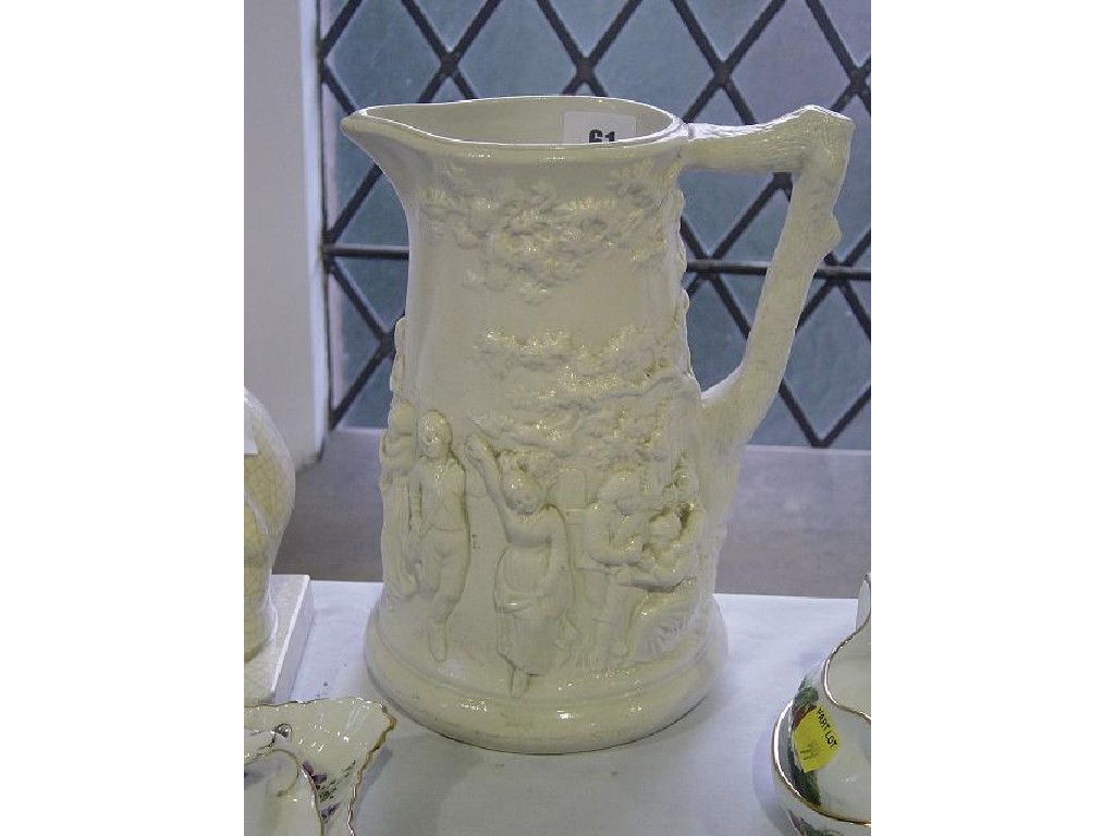 Appraisal: A th century Sarreguemines jug with relief moulded decoration of