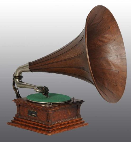 Appraisal: Victor M Phonograph with Wood Horn Description Oak Working Condition