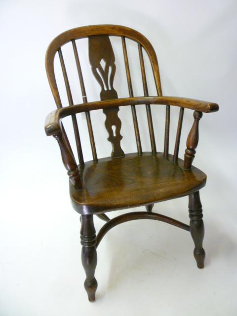 Appraisal: A CHILD'S ASH AND ELM WINDSOR CHAIR late th century