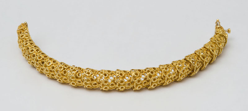 Appraisal: K TEXTURED GOLD BRACELET With two extra links stamped '