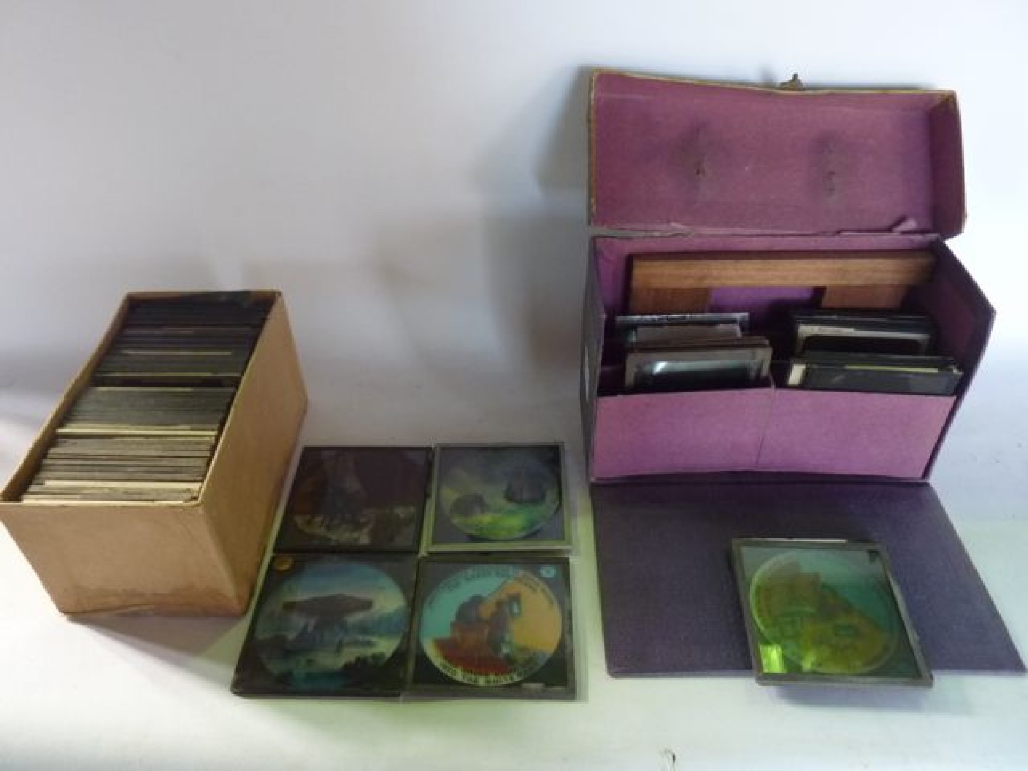 Appraisal: Approximately fifty five glass magic lantern slides detailing subjects to