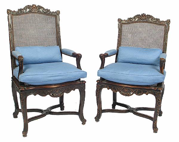 Appraisal: A pair of Louis XIV style walnut fauteuils height in