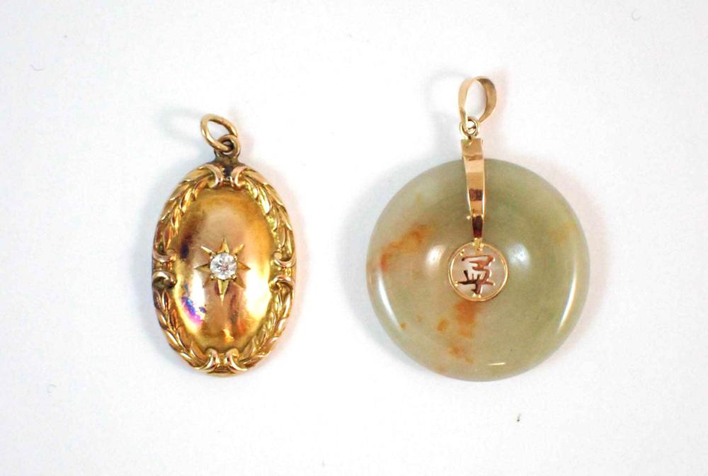 Appraisal: TWO YELLOW GOLD PENDANTS including a light green and orange