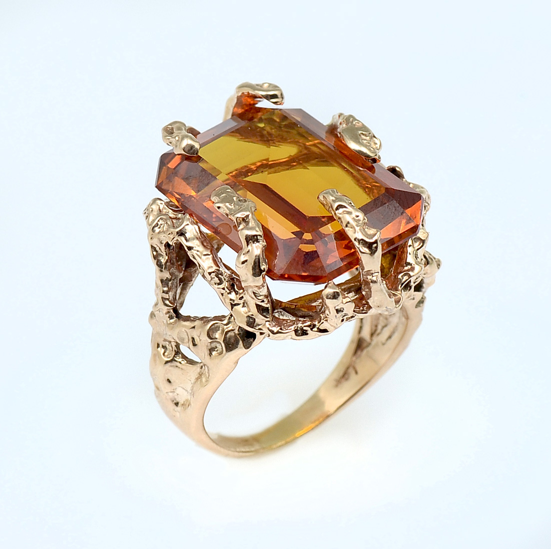 Appraisal: K 'S CT CITRINE RING Vivid CT emerald cut Madeira