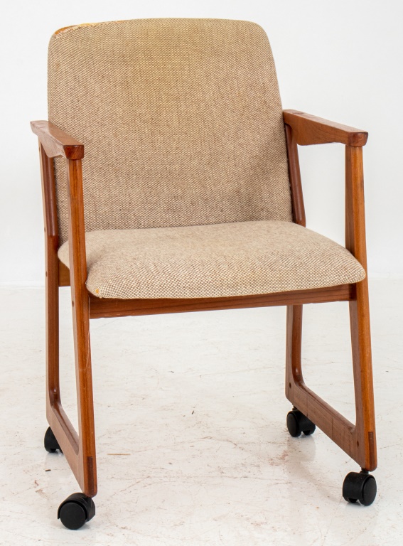 Appraisal: DANISH MODERN ROLLING CHAIR Danish Modern rolling armchair upholstered in