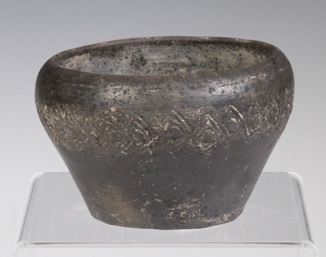 Appraisal: CHINESE BLACK CLAY ARCHAIC BOWL Flat bottom bowl with bulbous