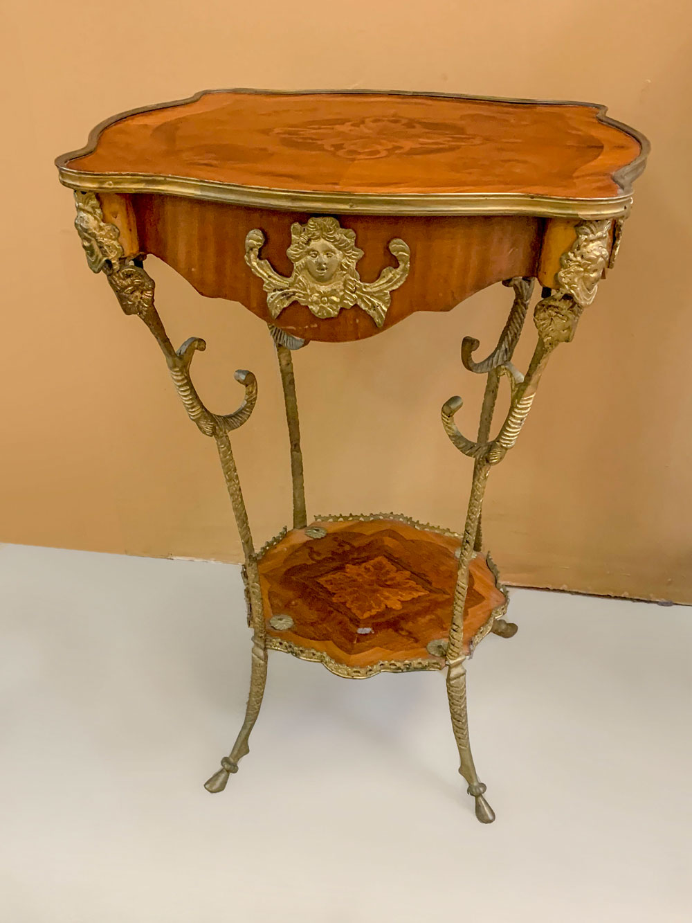 Appraisal: METAL MOUNTED PARLOR TABLE Marquetry inlaid French parlor table having