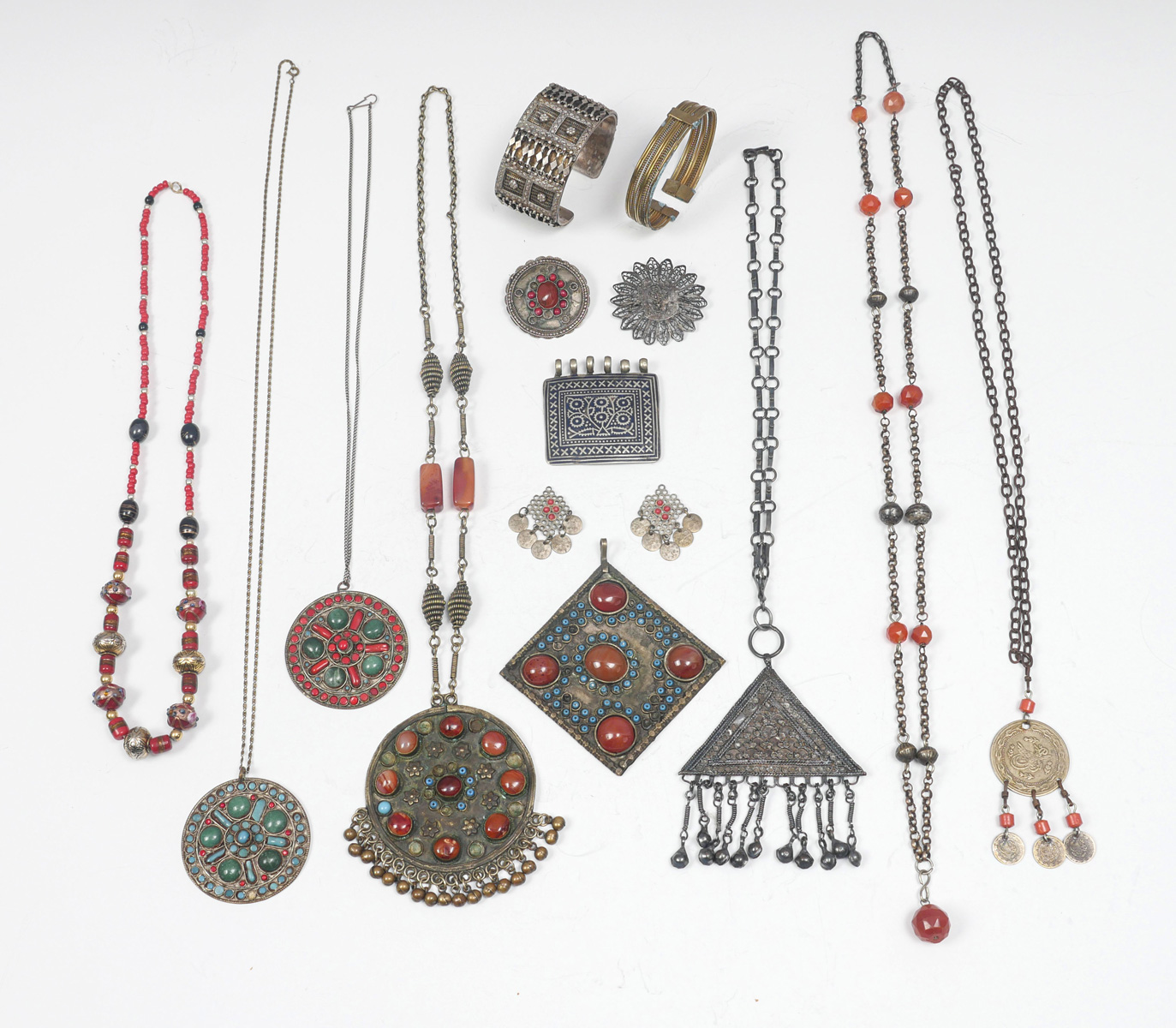 Appraisal: MULTI PIECE ETHNIC JEWELRY LOT necklaces with pendants pendants cuff