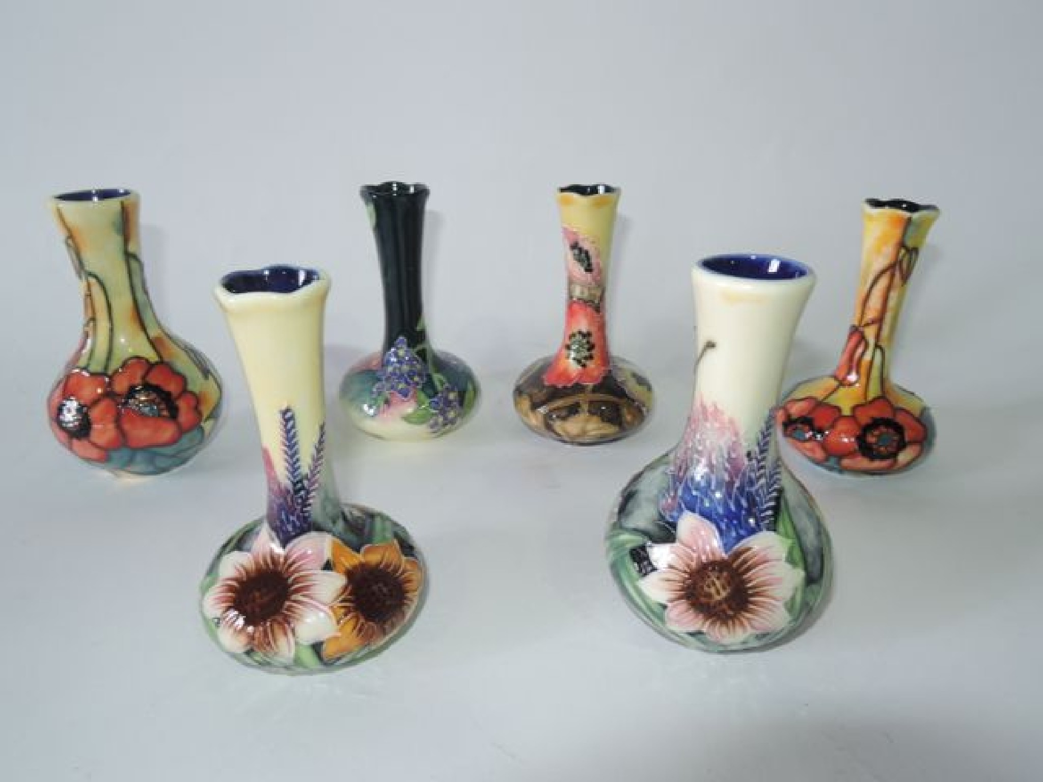 Appraisal: A set of six Old Tupton ware vases all with