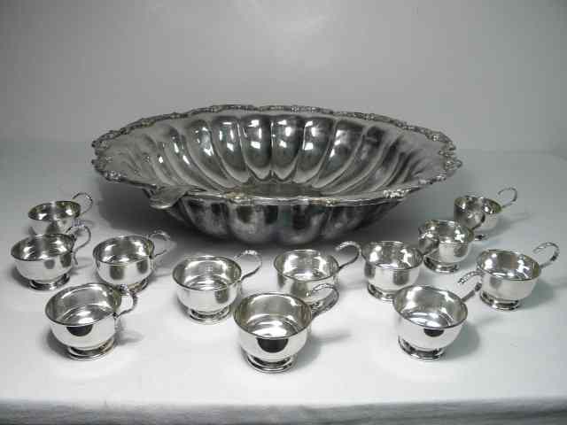 Appraisal: A large Samuel Peace silver plated punch bowl with cups