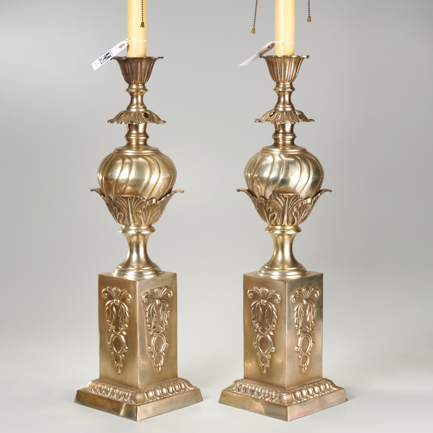 Appraisal: LARGE PAIR NEOCLASSICAL STYLE SILVER METAL LAMPS th c heavy