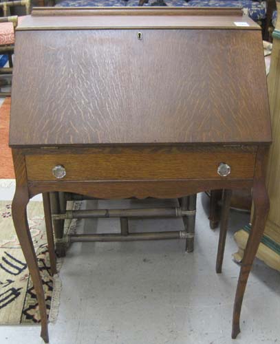 Appraisal: AN OAK SLANT-FRONT WRITING DESK American c Dimensions H x